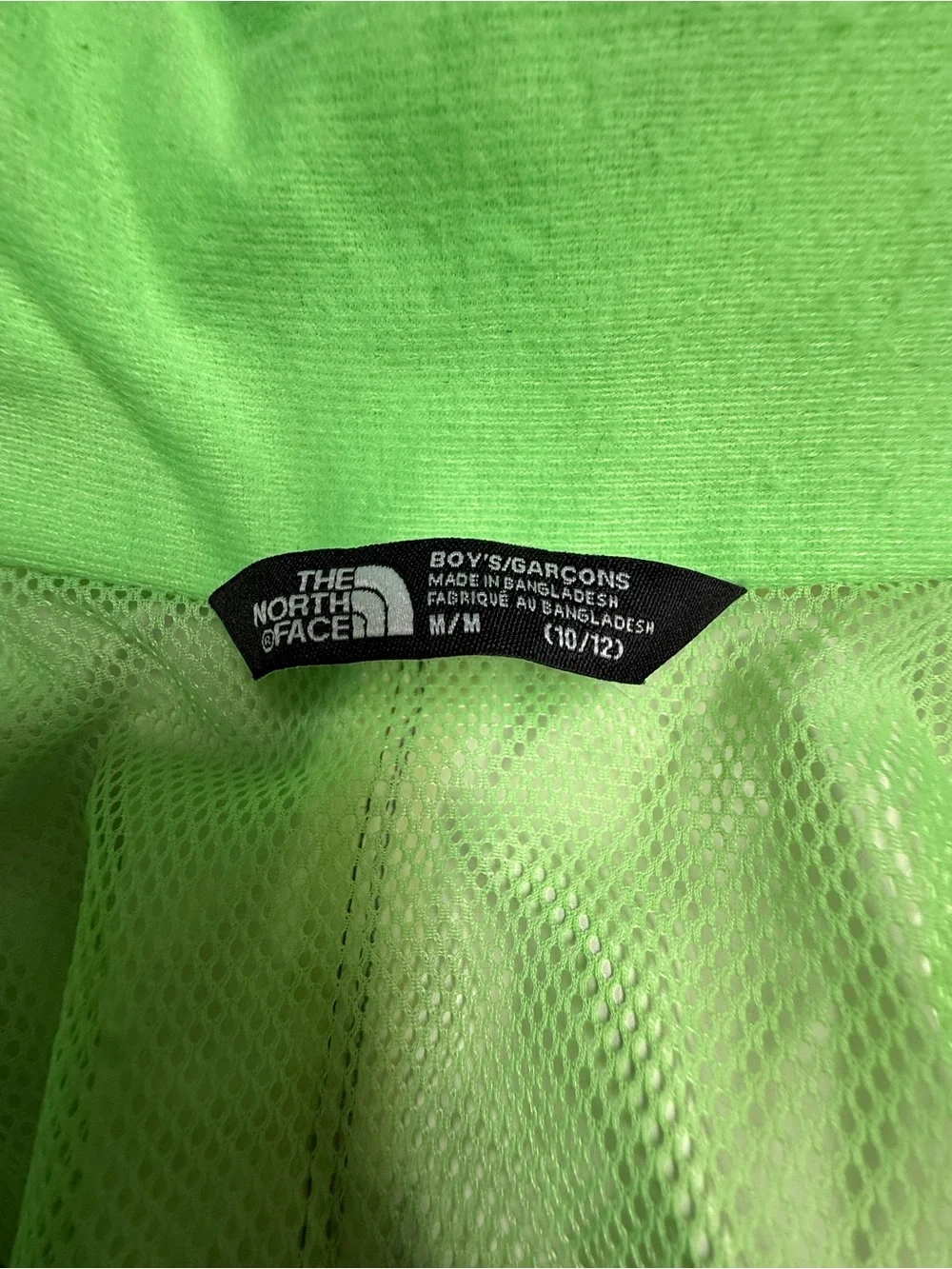 The North Face Kids Black Raincoat with Neon Green Lining